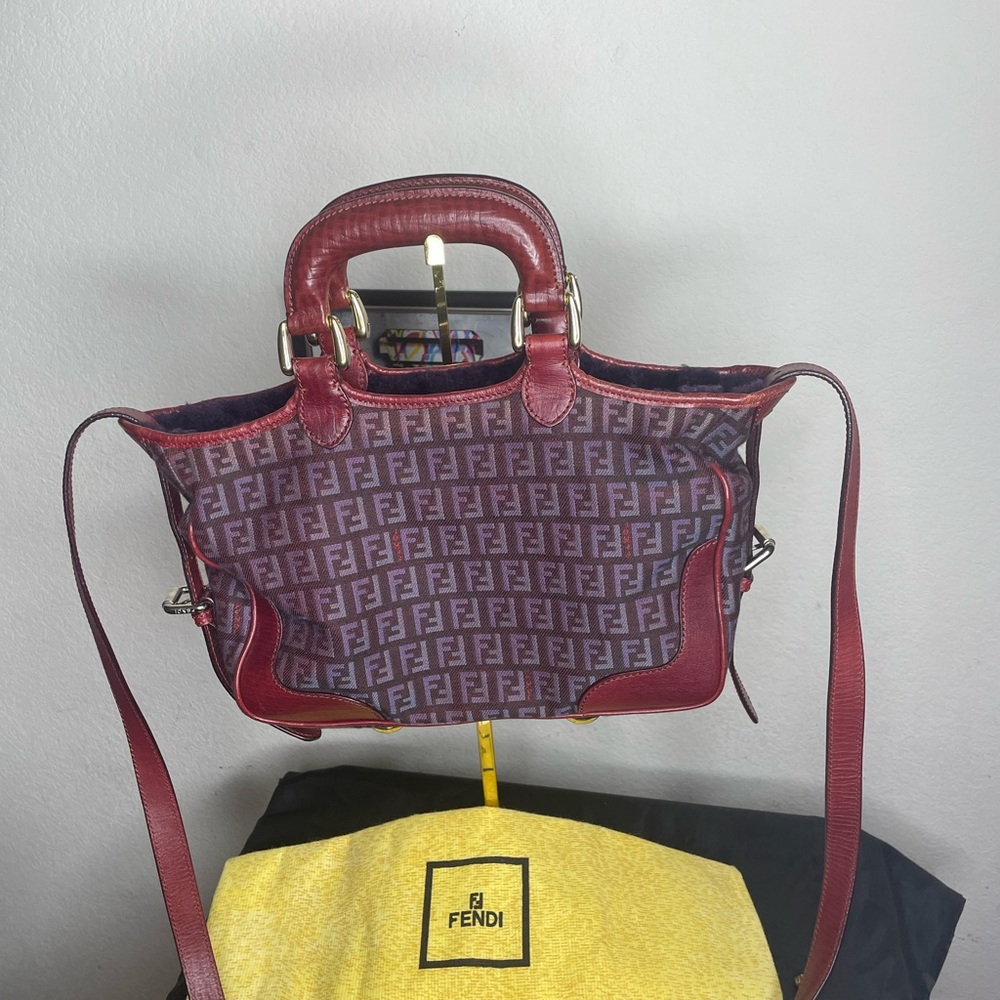 Fendi canvas and leather Shirling satchel in the color, eggplant